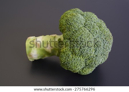 Healthy Green Organic Broccoli isolated on Black