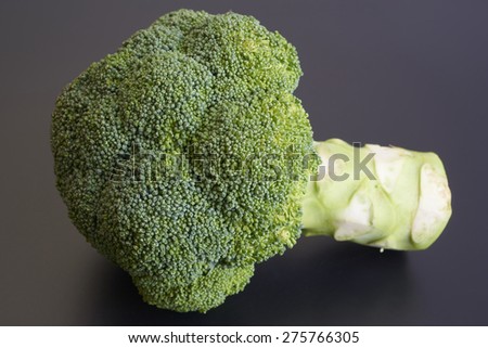 Healthy Green Organic Broccoli isolated on Black