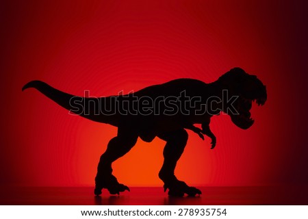 shooting dinosaur and monster model on red background