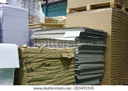 Stack of product on pallets in warehouse