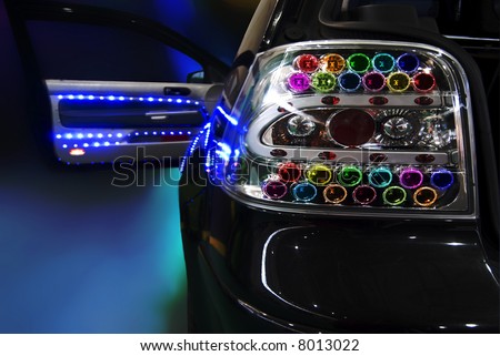 black tuning car with a lot of Light Bulb