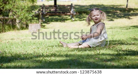 little girl play in the park