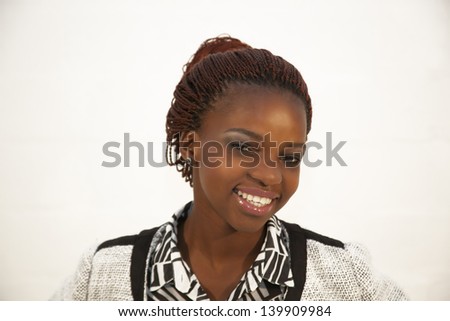 beautiful young African woman portrait against white