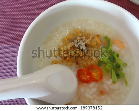 asian style breakfast soft boiled rice or rice soup with spoon