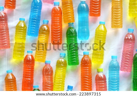 colorful water in plastic bottle, used for background