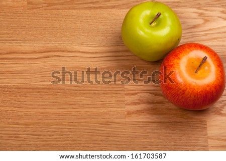 Two Apples on wooden Tabletop