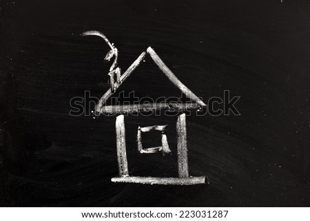 drawing of house on chalkboard