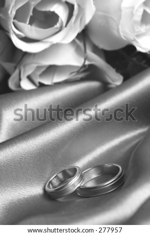 wedding bands with roses in black and white
