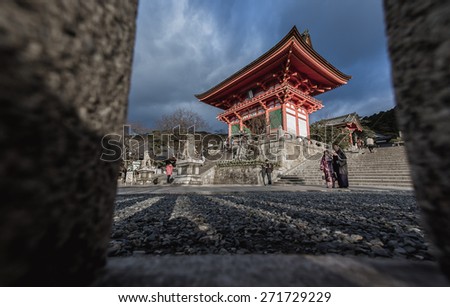 KYOTO, JAPAN - January 08,2015 : Kiyomizu dera Temple Gate in Kyoto Tourists walk near by main gate on January 08,2015