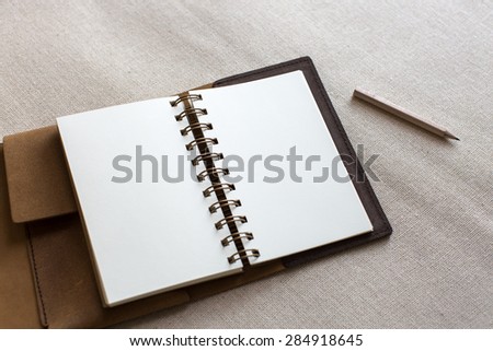 Blank Notepad and Pencil
