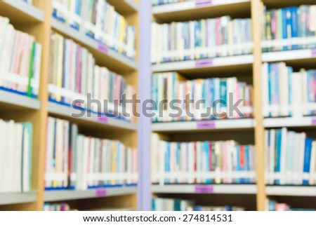 Blured books in public library. Blurred effect. Background for you pictures