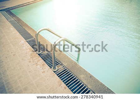 ladder of the swimming pool outdoor- Vintage retro picture style