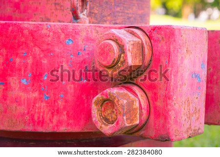 rusty pipe with flange and screw-nut of Old rusty oil pump