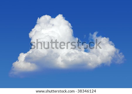 Lonely cumulus cloud in the blue sky