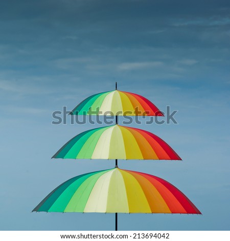 Colourful umbrella,the concept of protection.