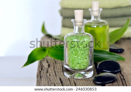 Refreshing spa set with scented sea salt and infused herbal water for relaxing aroma therapy or stone massage