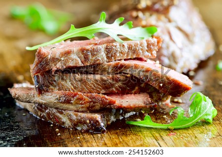 Grilled or roasted meat such as beef or pork freshly cooked and cut
