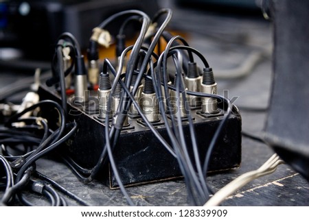 Stage box of audio connection cable or snake with XLR plugged in.