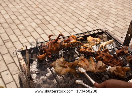 Barbeque Cuy (Guinea pig) at traditional food festival in Ecuador