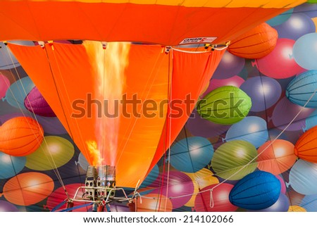 BARNEVELD, THE NETHERLANDS - AUGUST 28: Colorful air balloons taking off at international balloon festival Balloonfiesta on August 28,2014 in Barneveld, The Netherlands