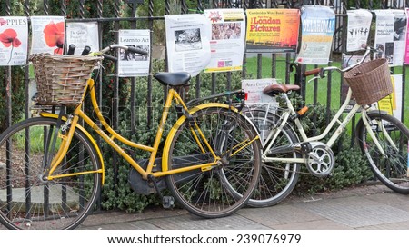 CAMBRIDGE, ENGLAND, UK - OCTOBER 21, 2014: Bicycle and posters in Cambridge UK