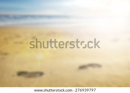 Blur Background Blue Sky Beach and foot print in Summer Season.
