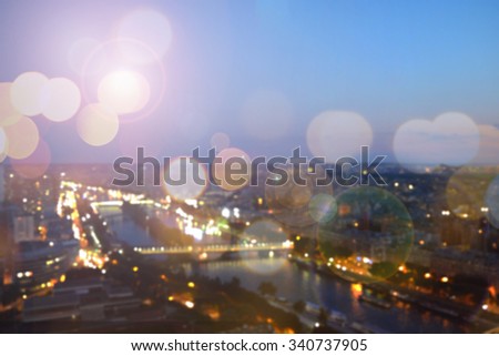 Abstract Background of Paris in sunset with lights and bokeh.