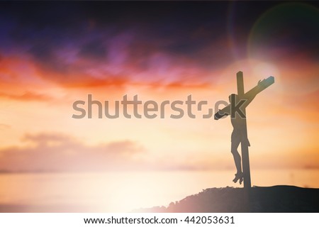 Silhouette of Jesus with Cross over sunset concept for religion, worship, Christmas, Easter, Redeemer Thanksgiving prayer and praise. revelation son happy world 2017