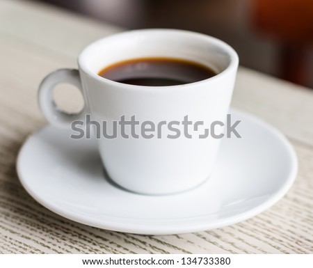 Cup Of Coffee On The Table
