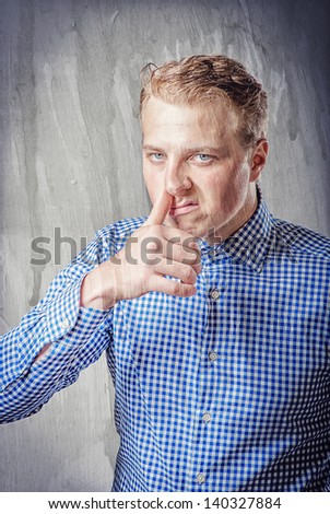 Portrait of a young businessman crying