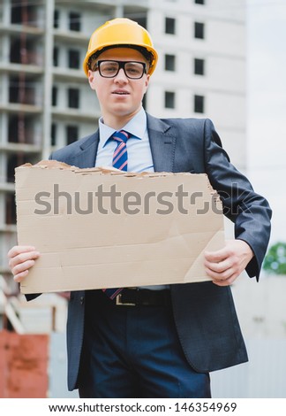 engineer holding a poster, poster