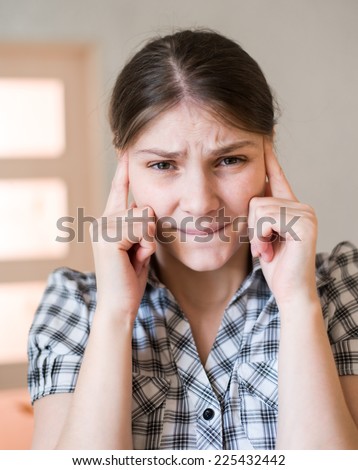 tired woman pain stress headache, holding his hands behind head