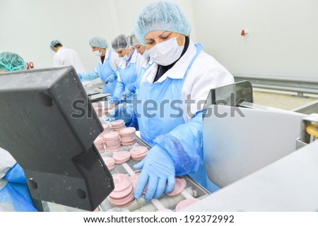 Kazatin, UKRAINE-September 15, 2010: Production of sausage and ham in a butcher shop, September 15, 2010 in a meat factory, Kazatin, Ukraine