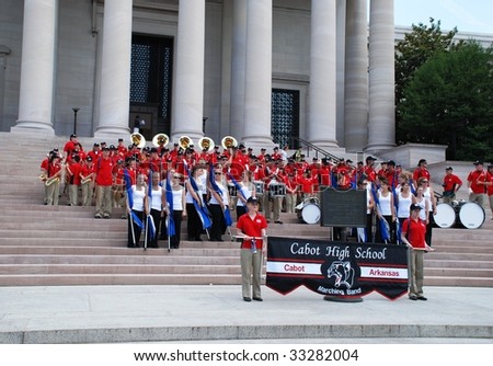 WASHINGTON, D.C. - JULY 4: Photoshooting for memory of  Cabot High School Band on steps Smithsonian museum on July 4, 2009 in Washington, D.C.