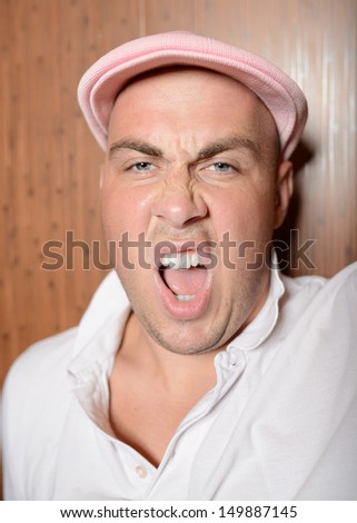 Angry young man screaming. emotion. angry