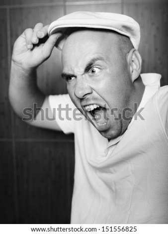 Angry young man screaming. emotion. angry. black.white