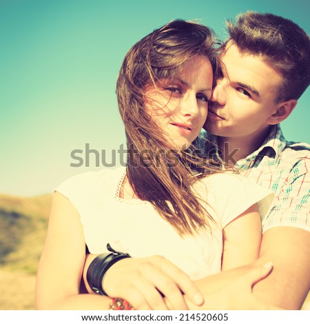 Young couple in love outdoor. Photo with instagram style filters