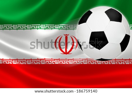 Ball streaks across the flag of Iran, where soccer is a national passion.
