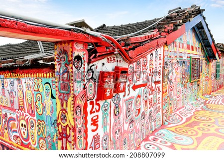 TAICHUNG, TAIWAN - JUL 11: Colorful graffiti dots the walls of Taichung\'s famous Rainbow Village July 11, 2013. The village has become a must-see attraction in Taiwan.
