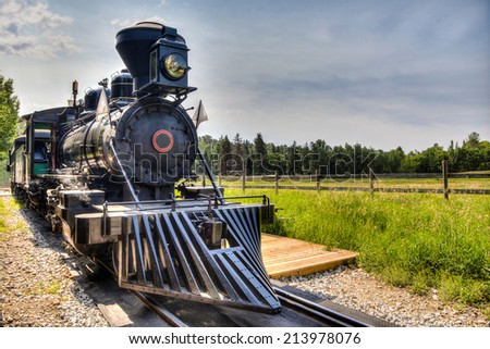 HDR rendering of a vintage locomotive steam engine with copy space.