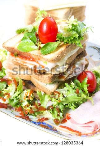 Grilled toast with vegetables, ketchup and cheese