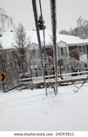 LOUISVILLE, KENTUCKY, 28 JANUARY: Electric utility lines brought down to the ground knocking out power in the Douglass Hills neighborhood in Louisville, Kentucky, during a powerful storm on January 28, 2009.