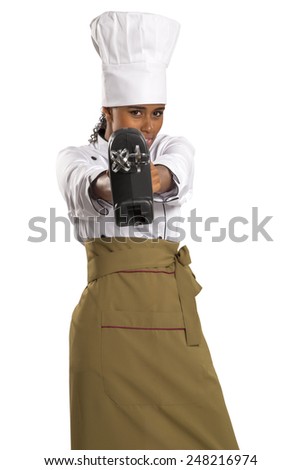 Woman cook in chef hat with electric mixer, isolated on white background.