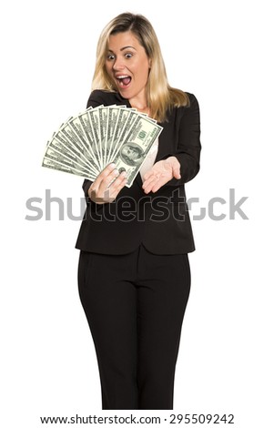 Happy young woman with money. Saving account concept.