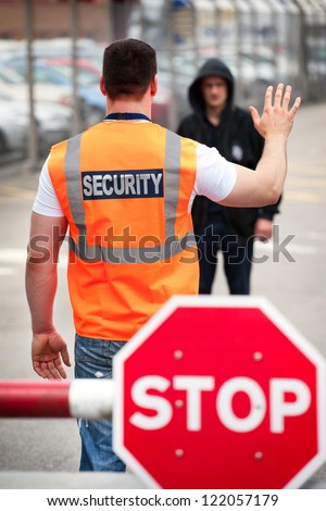 security guard stopping a stranger