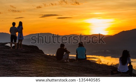 golden sunrise in Phataem, Thailand. This is very beautiful place. A beautiful silhouette photo with people.