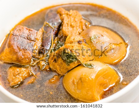 Eggs and pork in brown sauce