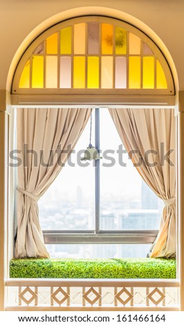 beautiful building window with curtain