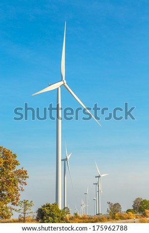 Eco power, Wind turbine electric  generator with blue sky in Huai Bong district, Thailand