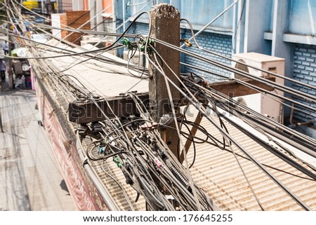many electrical wires cable on electric post